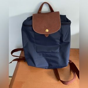 Longchamp backpack in navy blue. Excellent quality. Used once.